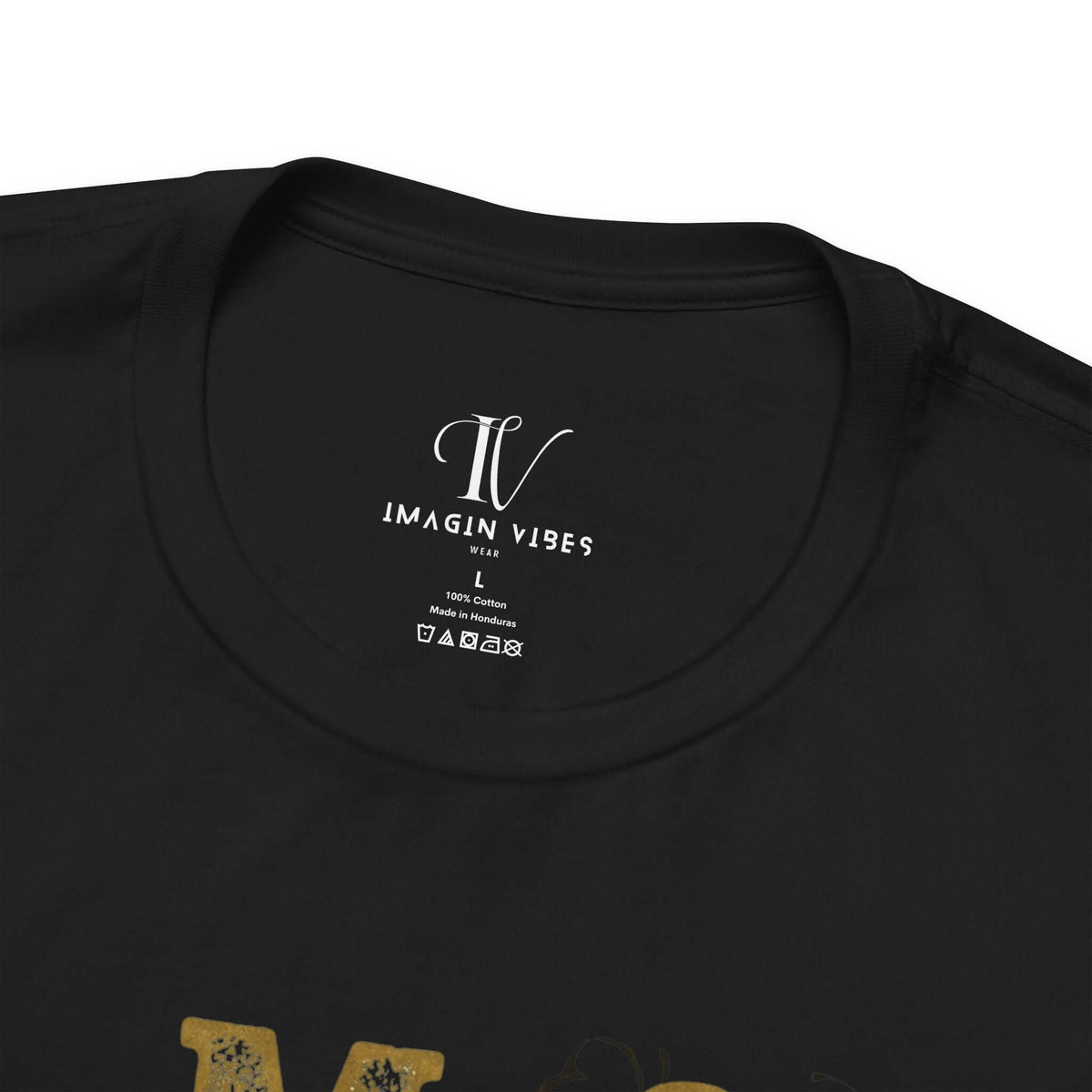 Close-up of the neck label on a black sarcastic graphic tee from Imagin Vibes, made of soft Bella Canvas cotton.