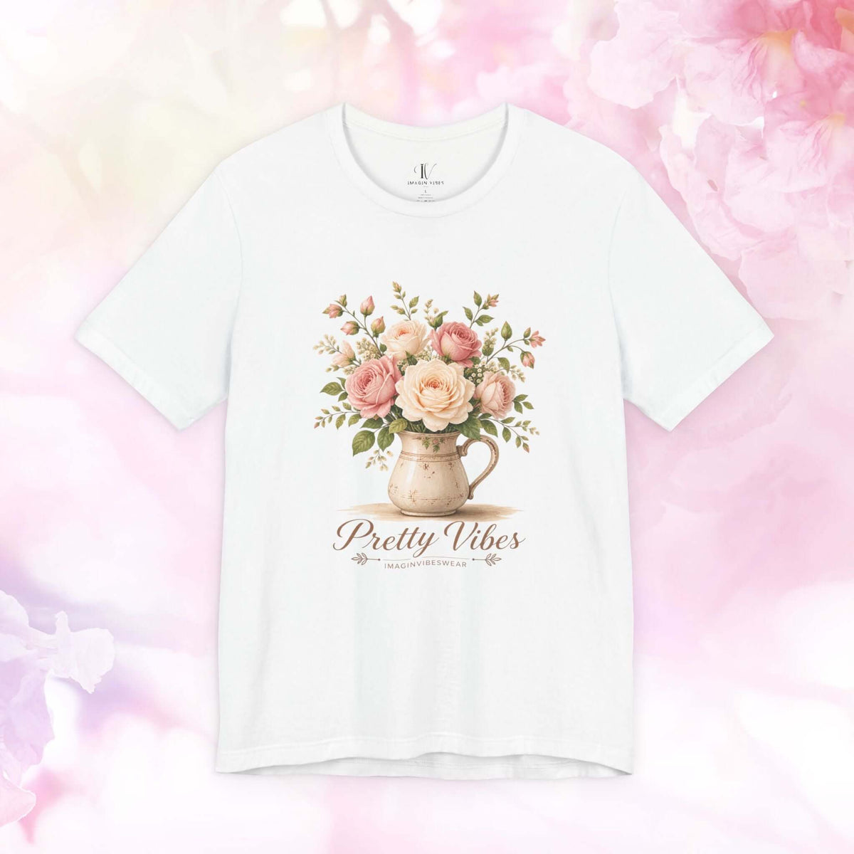 Pretty Vibes floral tee featuring a blush rose bouquet in a vintage pitcher on a soft white shirt.