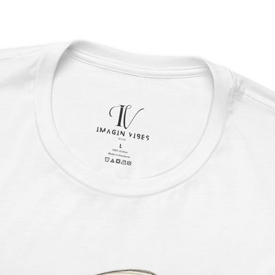 Close-up of the collar label on a white t-shirt featuring the what the shell turtle shirt and care instructions.