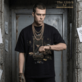 Model wearing The Gilded Chronos 404 time not found tee, featuring an hourglass design and artistic graphics.